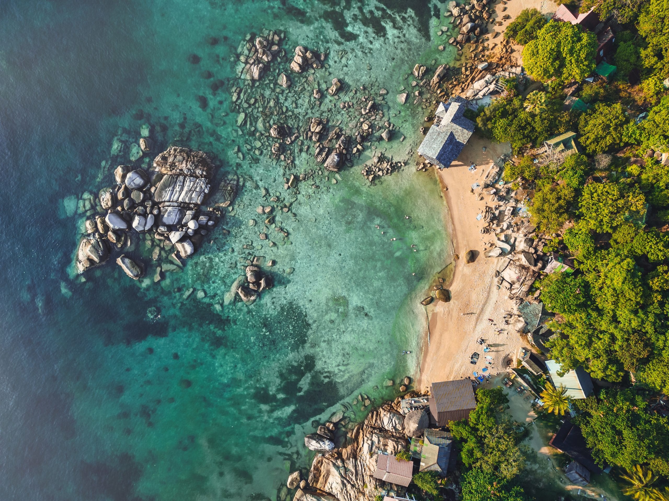 High season on Koh Tao, flat turquoise water and clear skies over the west coast