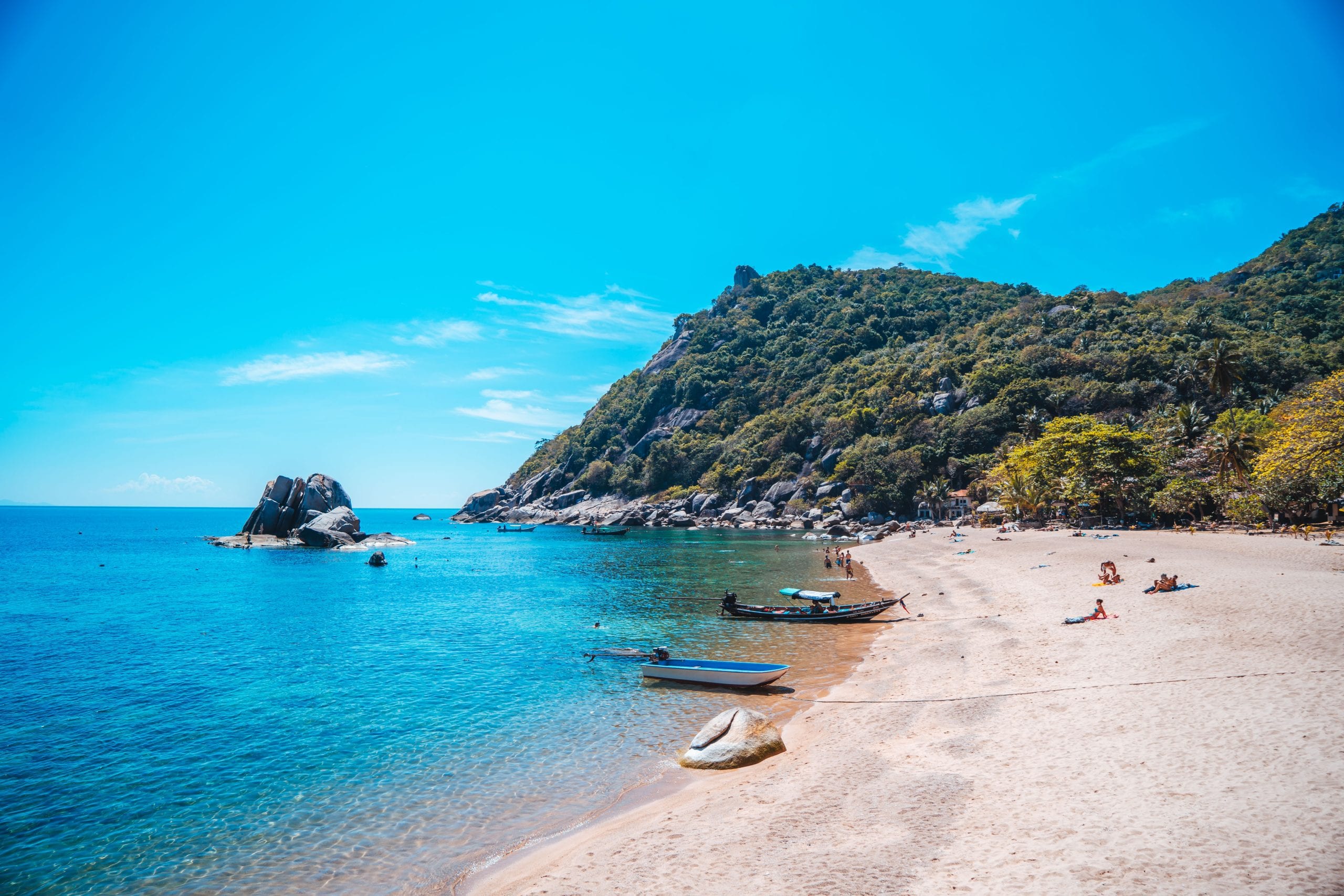 Tanote Bay, granite boulders rising out of calm turquoise water