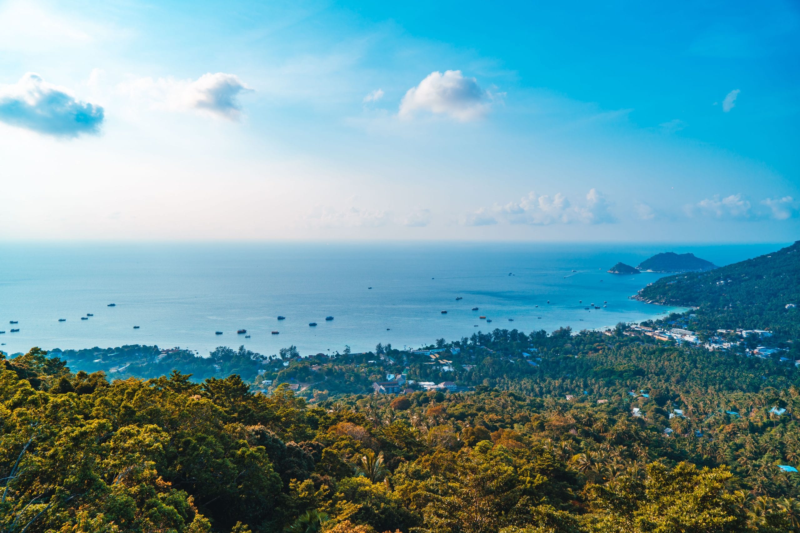 A high viewpoint over Koh Tao, jungle dropping away to the coast
