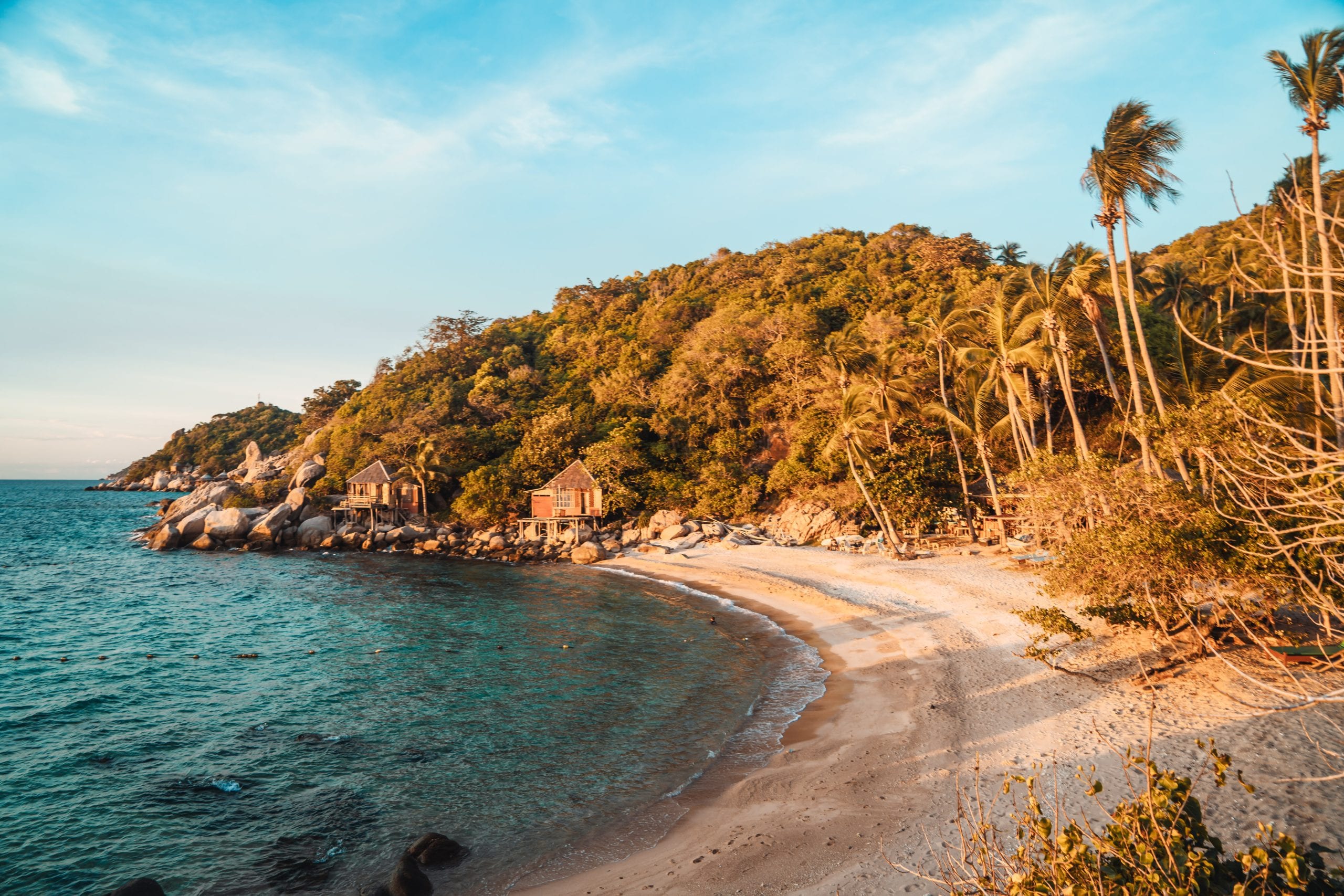 A quiet cove reached on foot, the reward at the end of a Koh Tao trail