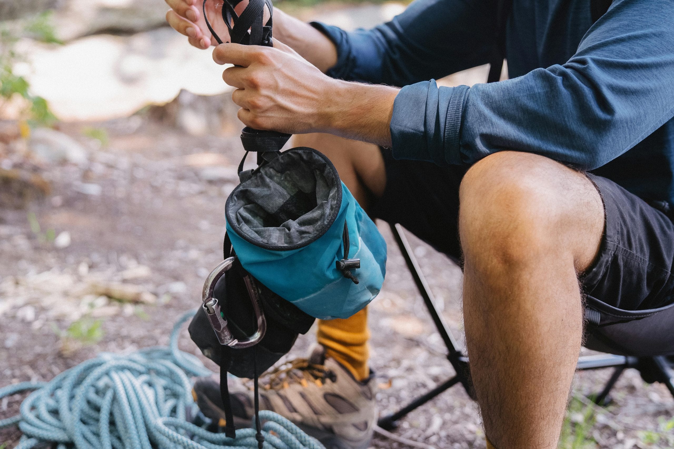 Climbing gear laid out, ropes and shoes before a session